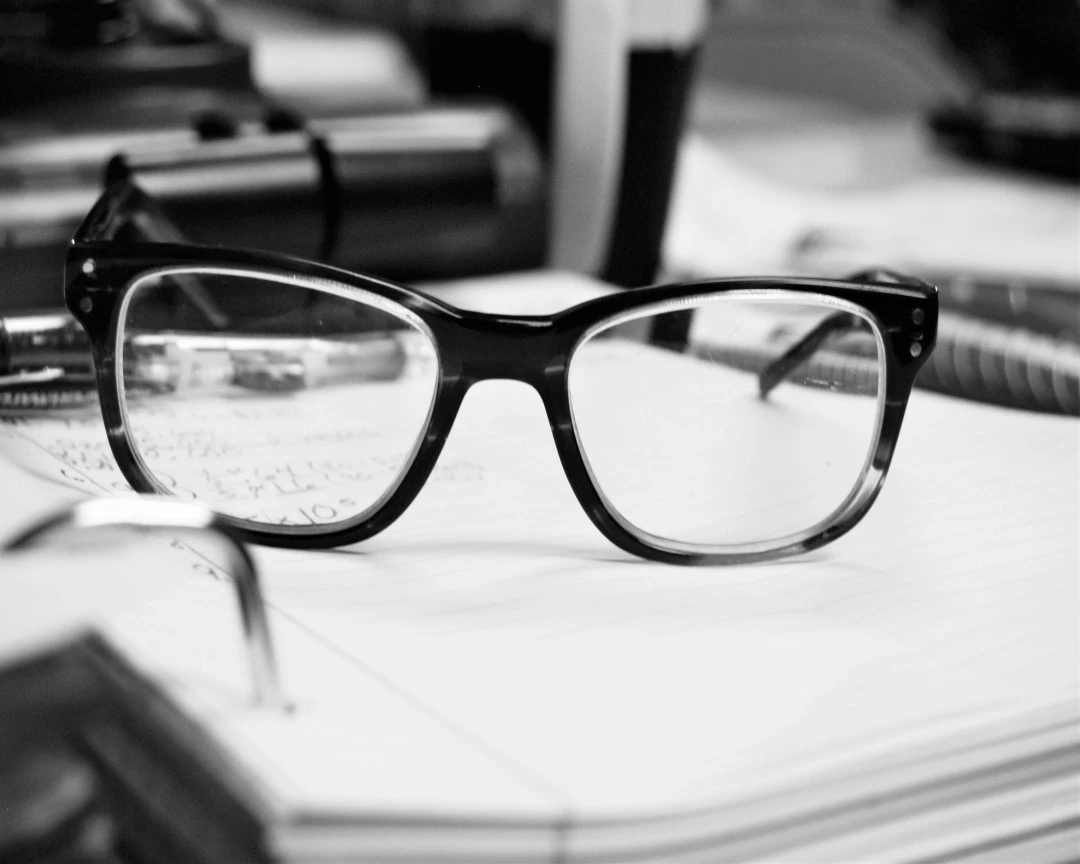 Close up photo of black framed eyeglasses
